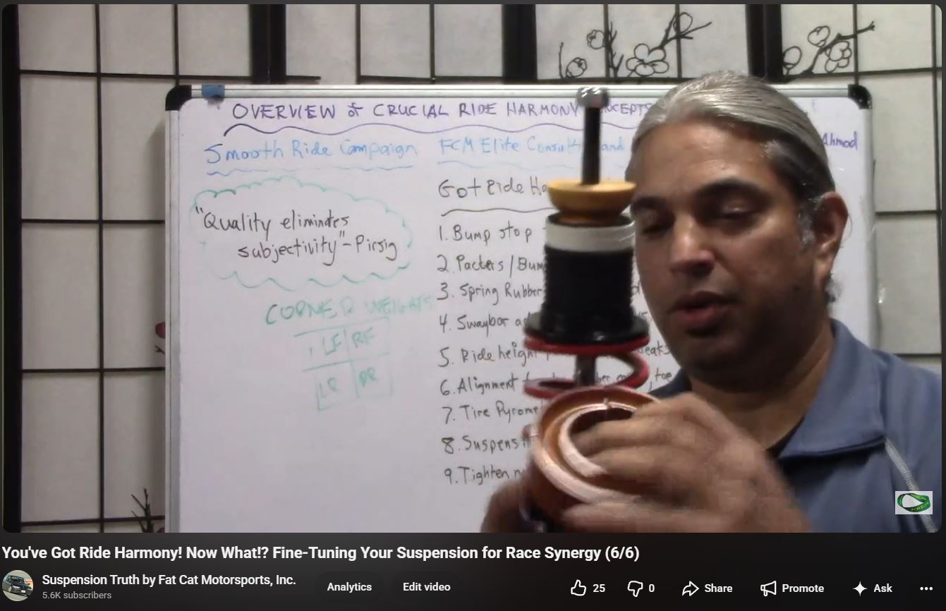 Jalal demonstrating bump stops, a spring rubber, and other suspension fine-tuning tools